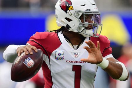 Arizona Cardinals quarterback Kyler Murray looks downfield to pass during a game in the 2021 regular season.
