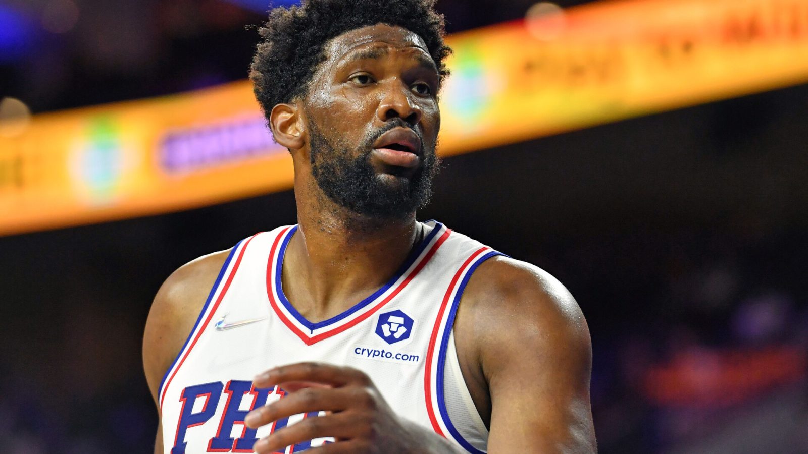 Philadelphia Sixers center #21 Joel Embiid reacts to a foul call in a 2021 home game.