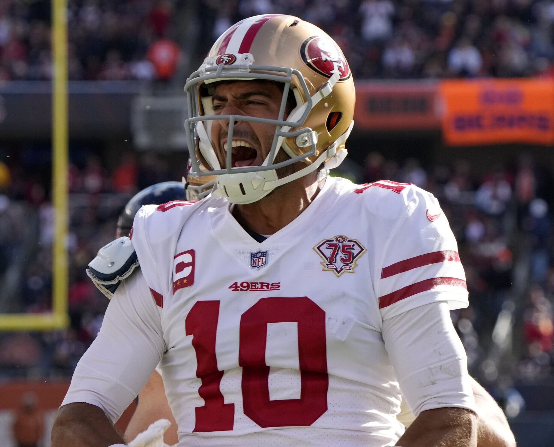 San Francisco 49ers quarterback Jimmy Garoppolo reacts after scoring a touchdown against the Chicago Bears
