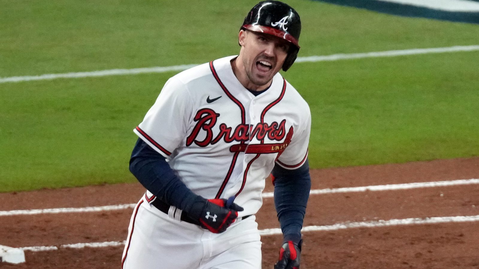 Atlanta Braves center fielder Adam Duvall hits a grand slam home run against the Houston Astros during the first inning of Game 5 of the 2021 World Series at Truist Park
