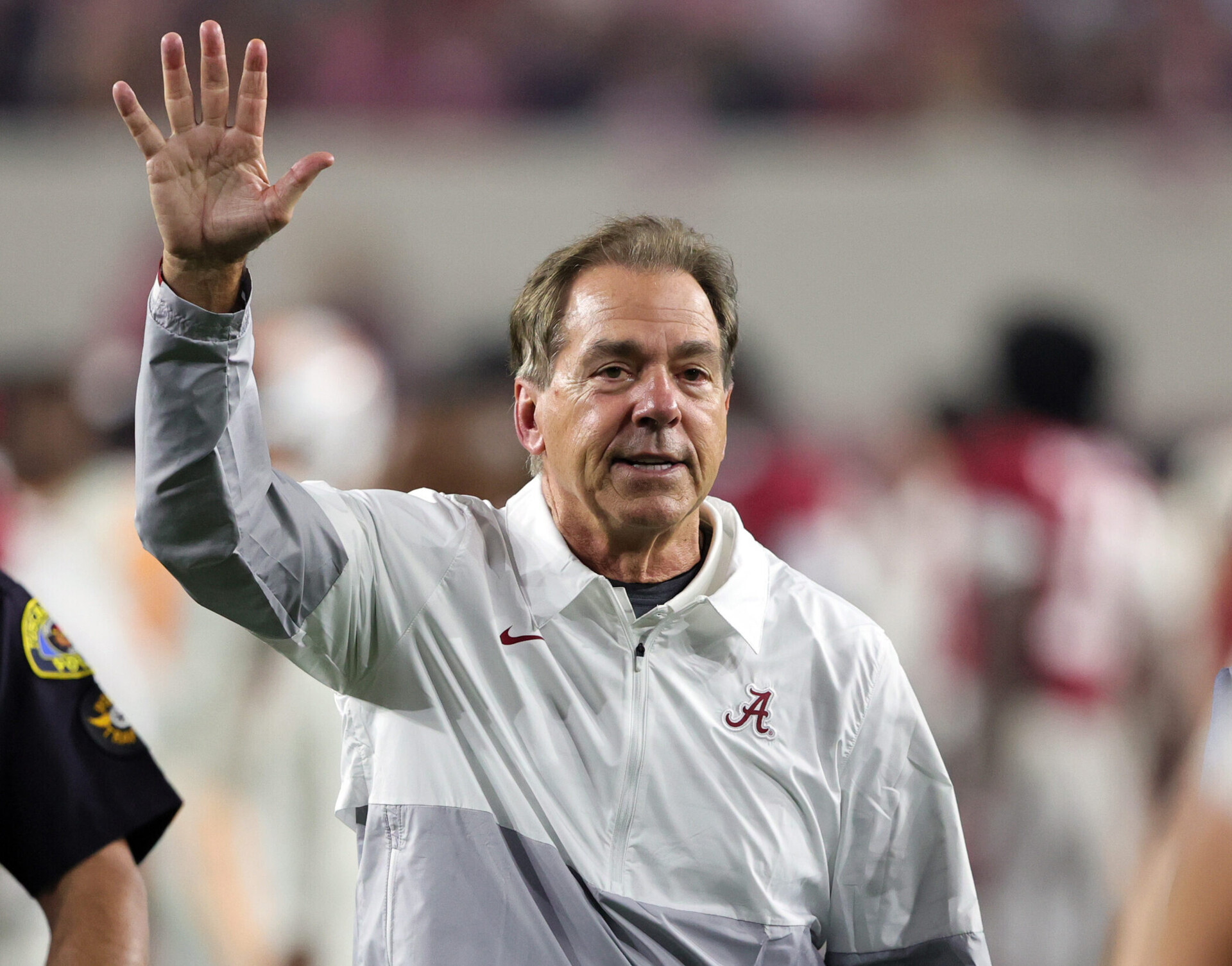 Alabama Crimson Tide head coach Nick Saban waves to fans after defeating the Tennessee Volunteers