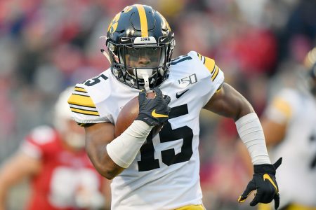 Tyler Goodson #15 of the Iowa Hawkeyes runs with the football in the first half against the Wisconsin Badgers at Camp Randall Stadium on November 09, 2019 in Madison, Wisconsin.