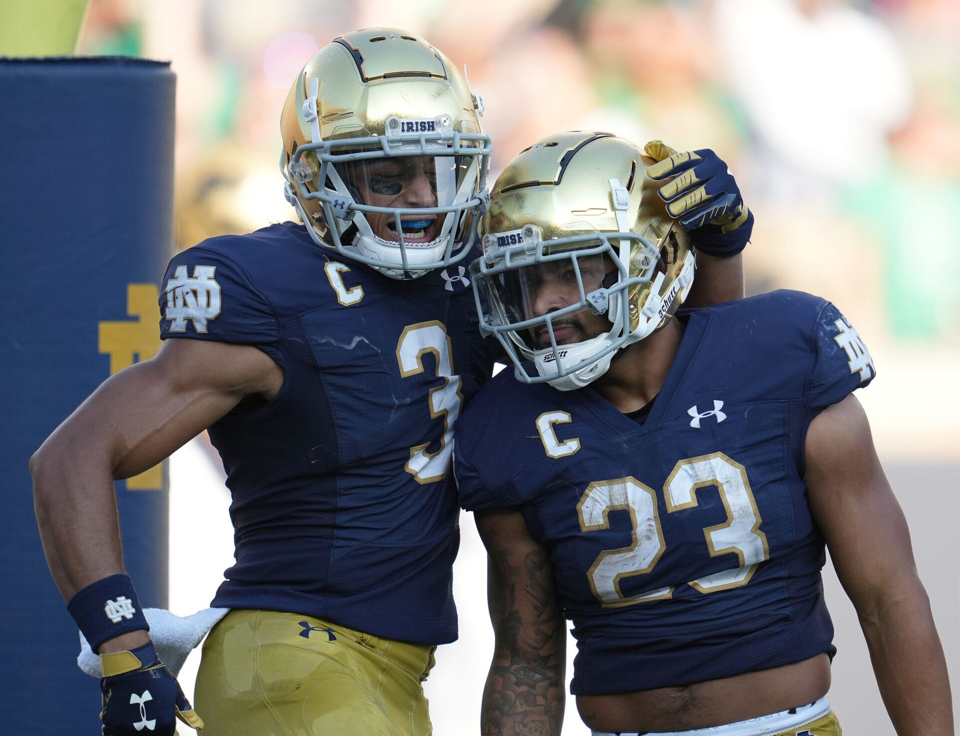 Notre Dame Fighting Irish running back Kyren Williams (23) celebrates with Notre Dame Fighting Irish wide receiver Avery Davis (3) and teammates after scoring a touchdown during a game between the Notre Dame Fighting Irish and the Purdue Boilermakers on September 18, 2021, at Notre Dame Stadium, in South Bend, In