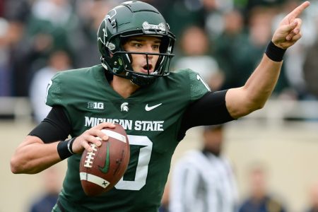 Michigan State - QB Payton Thorne looks to pass downfield against Michigan.