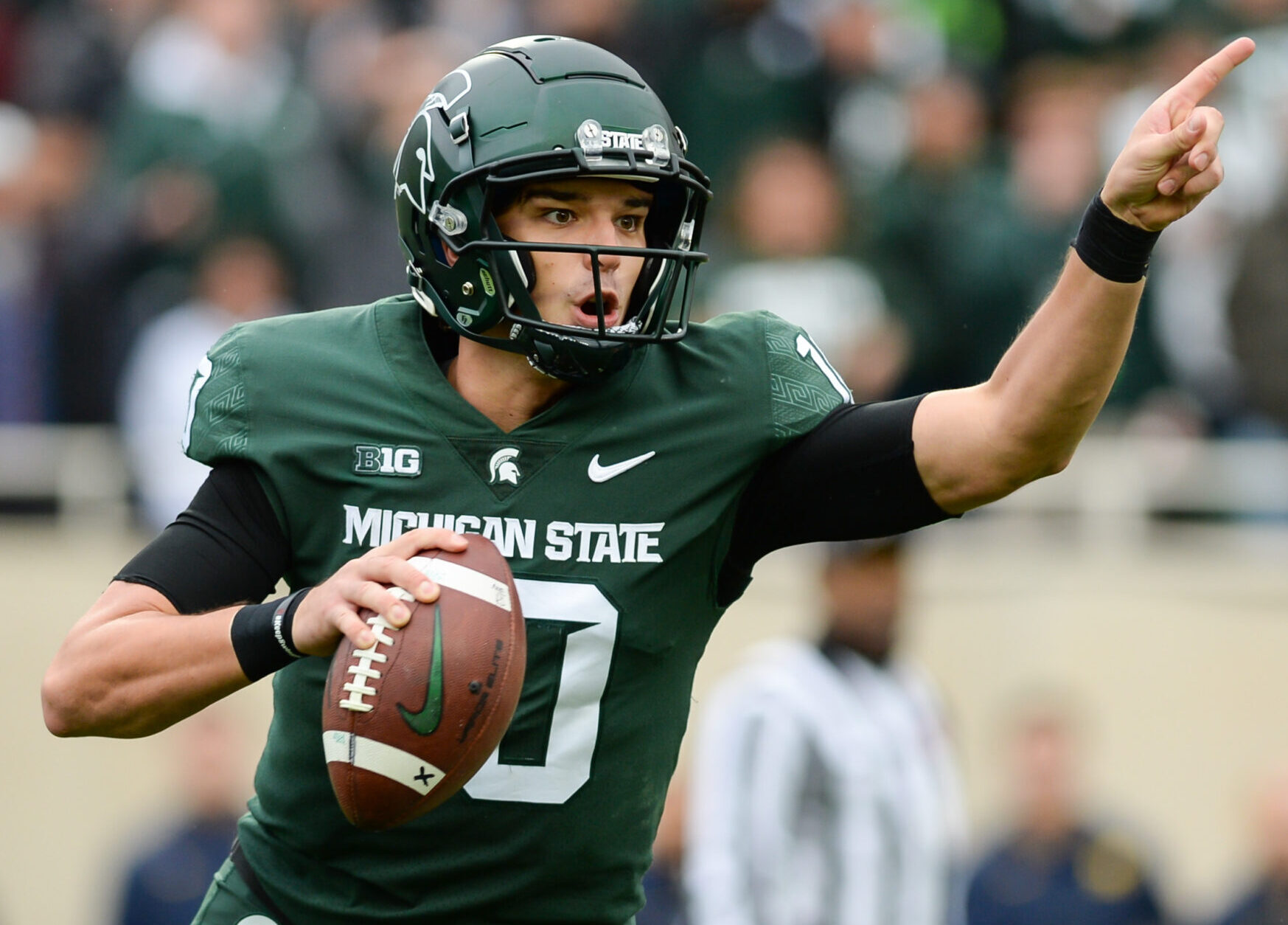 Michigan State - QB Payton Thorne looks to pass downfield against Michigan.