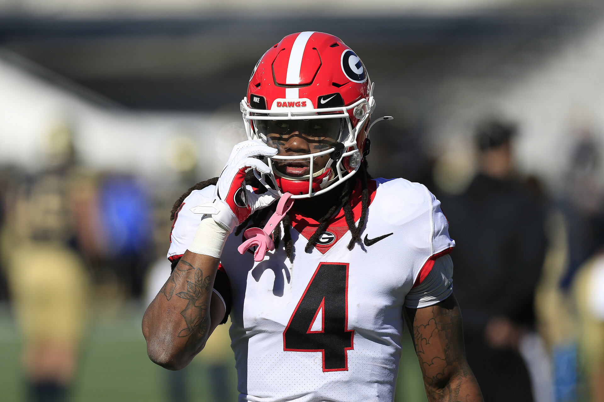 Running back James Cook #4 of the Georgia Bulldogs during the college football game between the Georgia Tech Yellow Jackets and the University of Georgia Bulldogs on November 27, 2021 at Bobby Dodd Stadium in Atlanta, GA