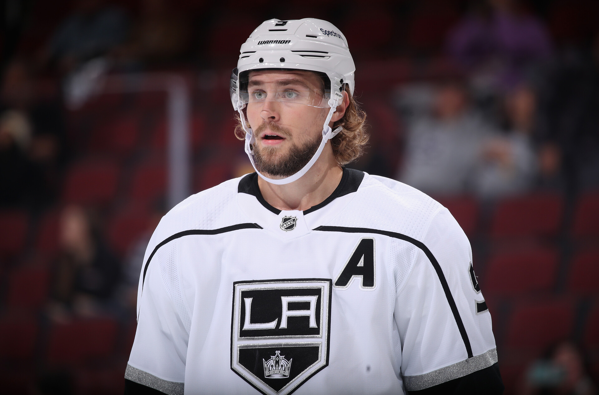 Adrian Kempe #9 of the Los Angeles Kings on the ice during the second period of the preseason NHL game against the Arizona Coyotes at Gila River Arena on September 27, 2021 in Glendale, Arizona. The Coyotes defeated the Kings 2-1.