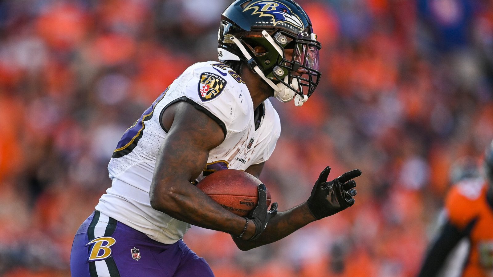 Latavius Murray #28 of the Baltimore Ravens rushes against the Denver Broncos in the third quarter of a game at Empower Field at Mile High on October 3, 2021 in Denver, Colorado.