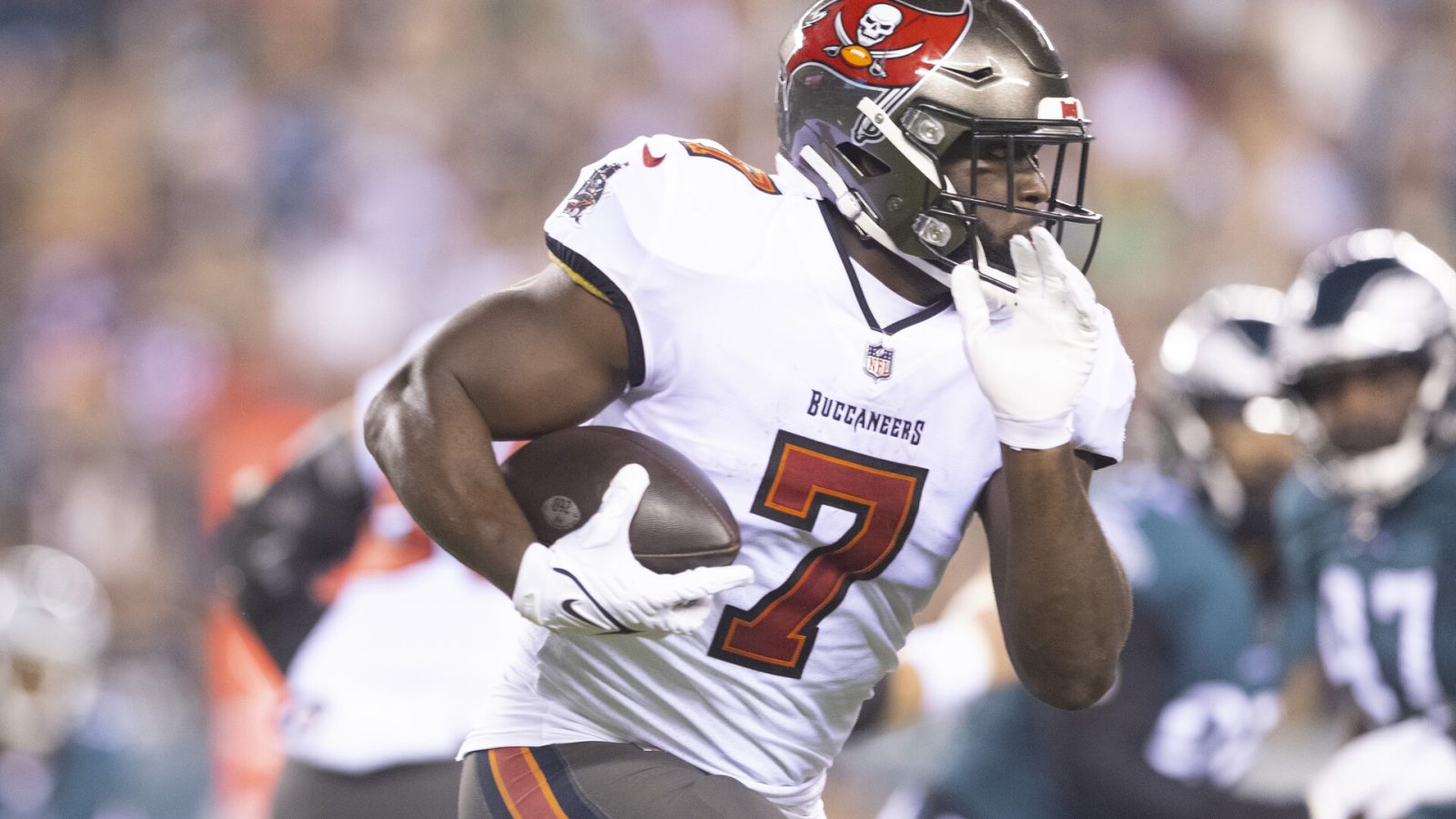 Leonard Fournette #7 of the Tampa Bay Buccaneers runs the ball against the Philadelphia Eagles at Lincoln Financial Field on October 14, 2021 in Philadelphia, Pennsylvania.