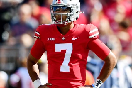 C.J. Stroud #7 of the Ohio State Buckeyes looks on during a game between the Maryland Terrapins and Ohio State Buckeyes at Ohio Stadium on October 09, 2021 in Columbus, Ohio.