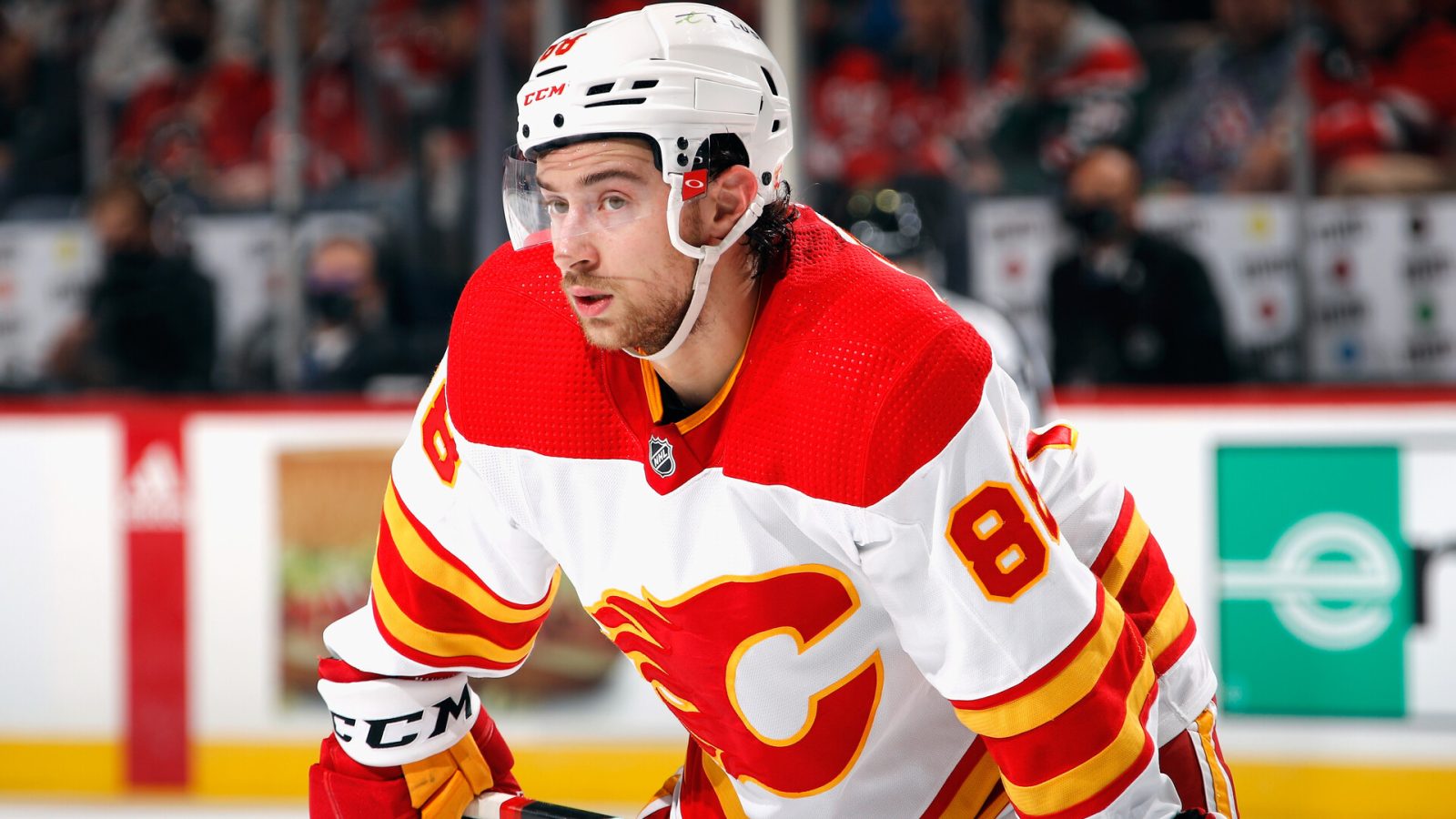 Andrew Mangiapane #88 of the Calgary Flames skates against the New Jersey Devils at the Prudential Center on October 26, 2021 in Newark, New Jersey.