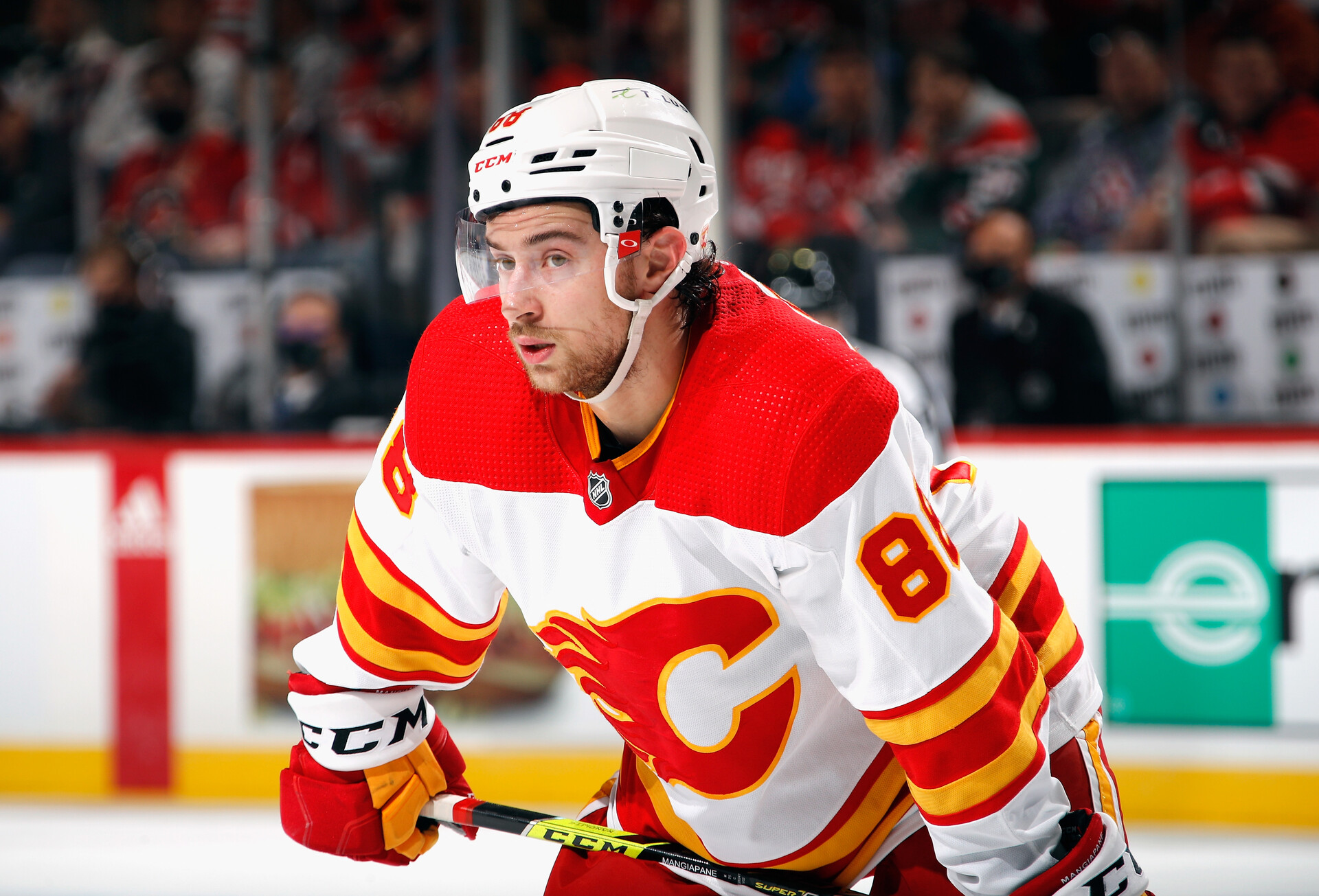 Andrew Mangiapane #88 of the Calgary Flames skates against the New Jersey Devils at the Prudential Center on October 26, 2021 in Newark, New Jersey.