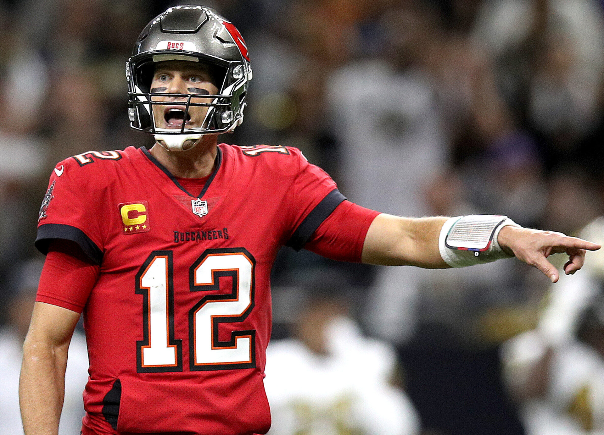 Tom Brady #12 of the Tampa Bay Buccaneers stands on the field during a NFL game against the New Orleans Saints at Caesars Superdome on October 31, 2021 in New Orleans, Louisiana.