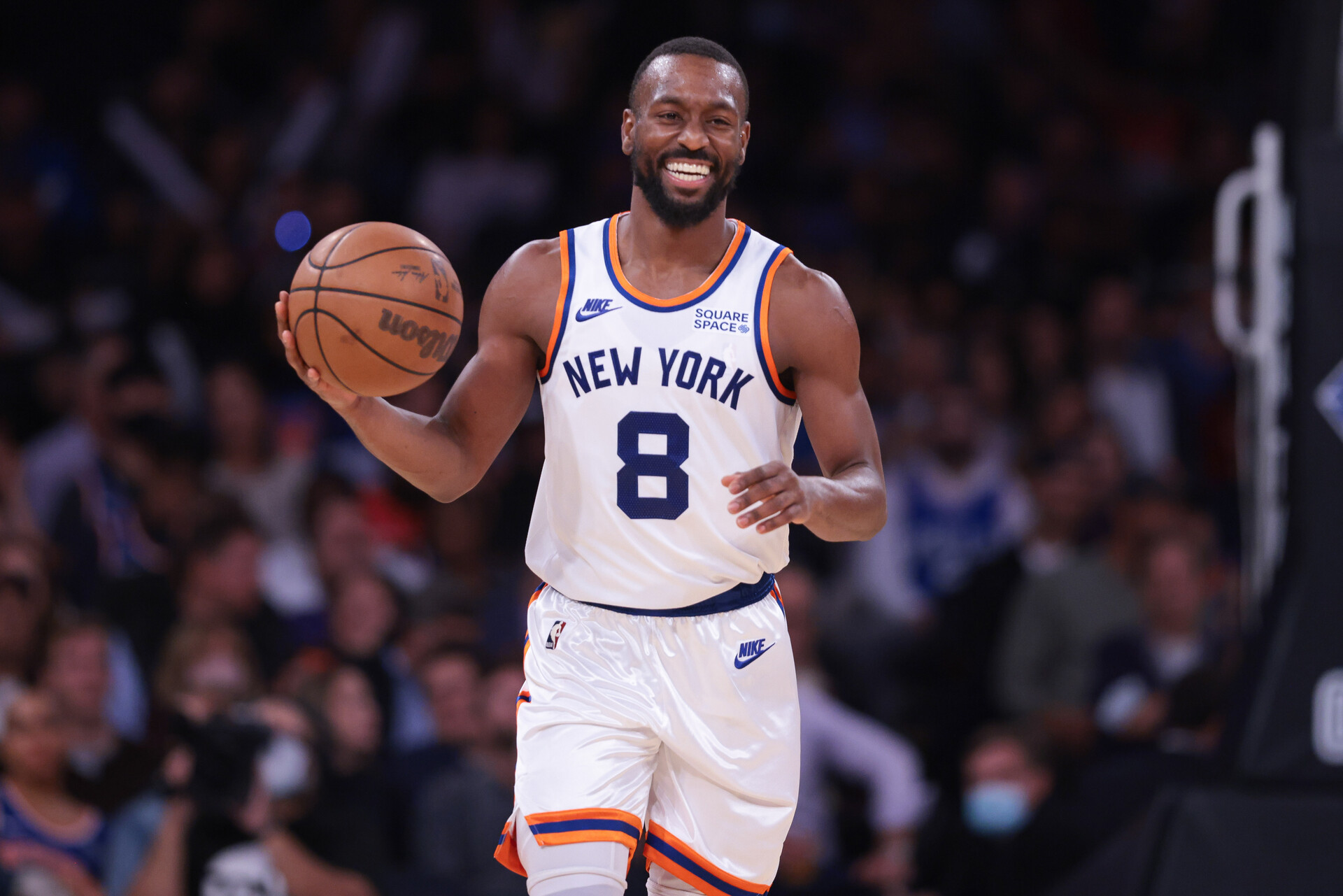 New York Knicks guard Kemba Walker dribbles up court against the Philadelphia 76ers 