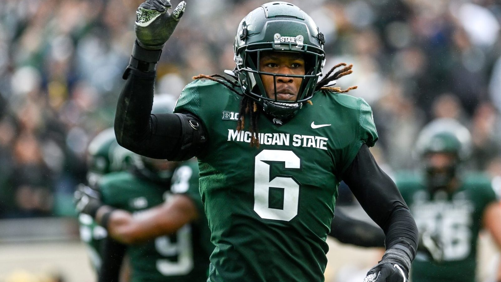 Michigan State's Quavaris Crouch celebrates a tackle against Michigan