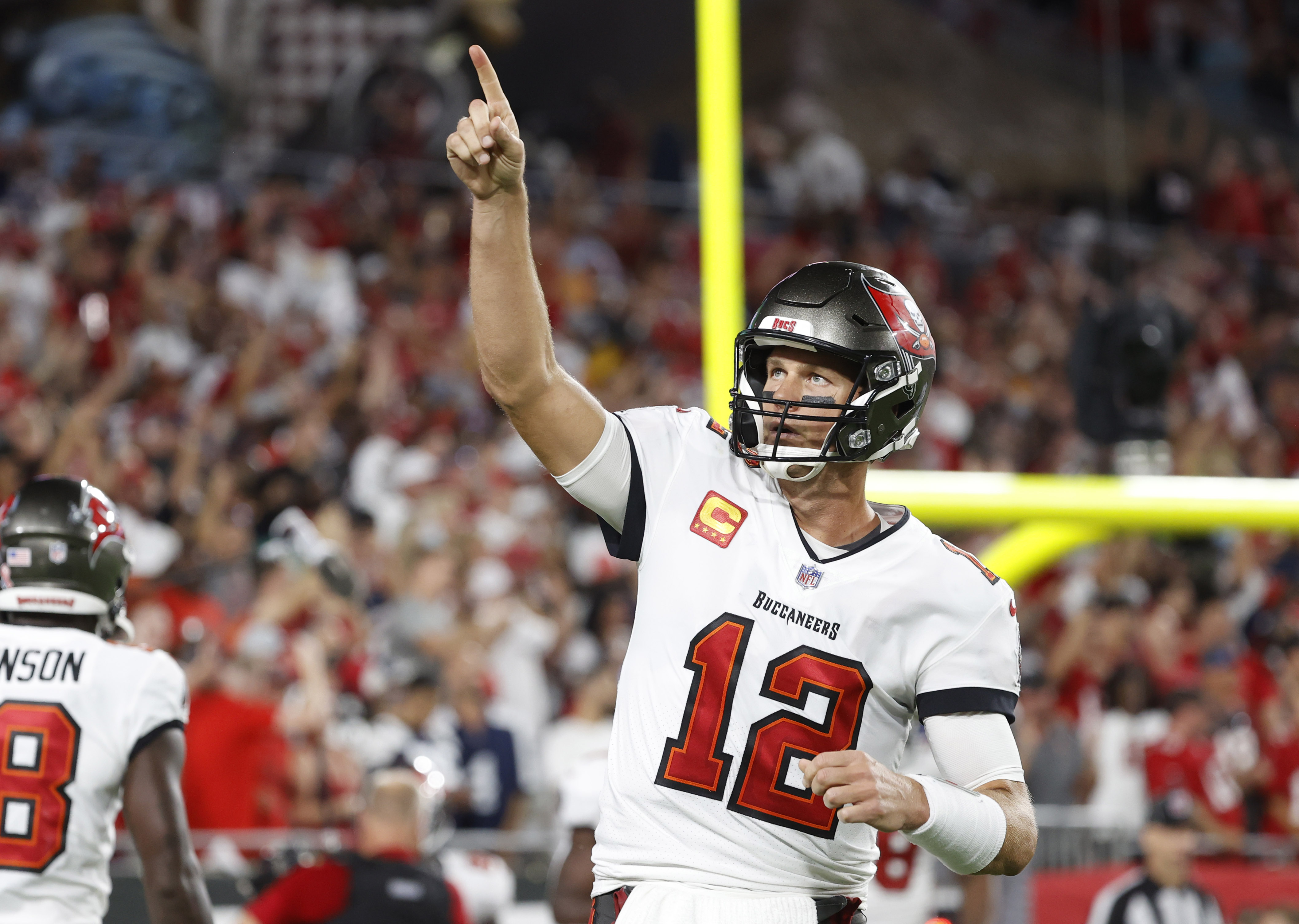 Tampa Bay Buccaneers quarterback Tom Brady (12) celebrates after a Buccaneers touchdown against the Dallas Cowboys