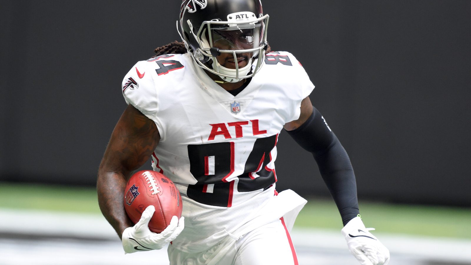 Atlanta Falcons running back Cordarrelle Patterson (84) returns the ball against the Philadelphia Eagles during the first quarter at Mercedes-Benz Stadium.