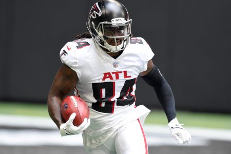 Atlanta Falcons running back Cordarrelle Patterson (84) returns the ball against the Philadelphia Eagles during the first quarter at Mercedes-Benz Stadium.