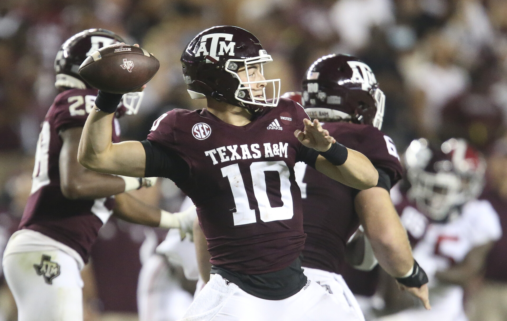Texas A&M quarterback quarterback Zach Calzada (10) throws a pass in a game against Alabama
