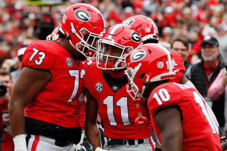 Georgia wide receiver Arian Smith (11) celebrates with his teammates after scoring a touchdown against Missouri