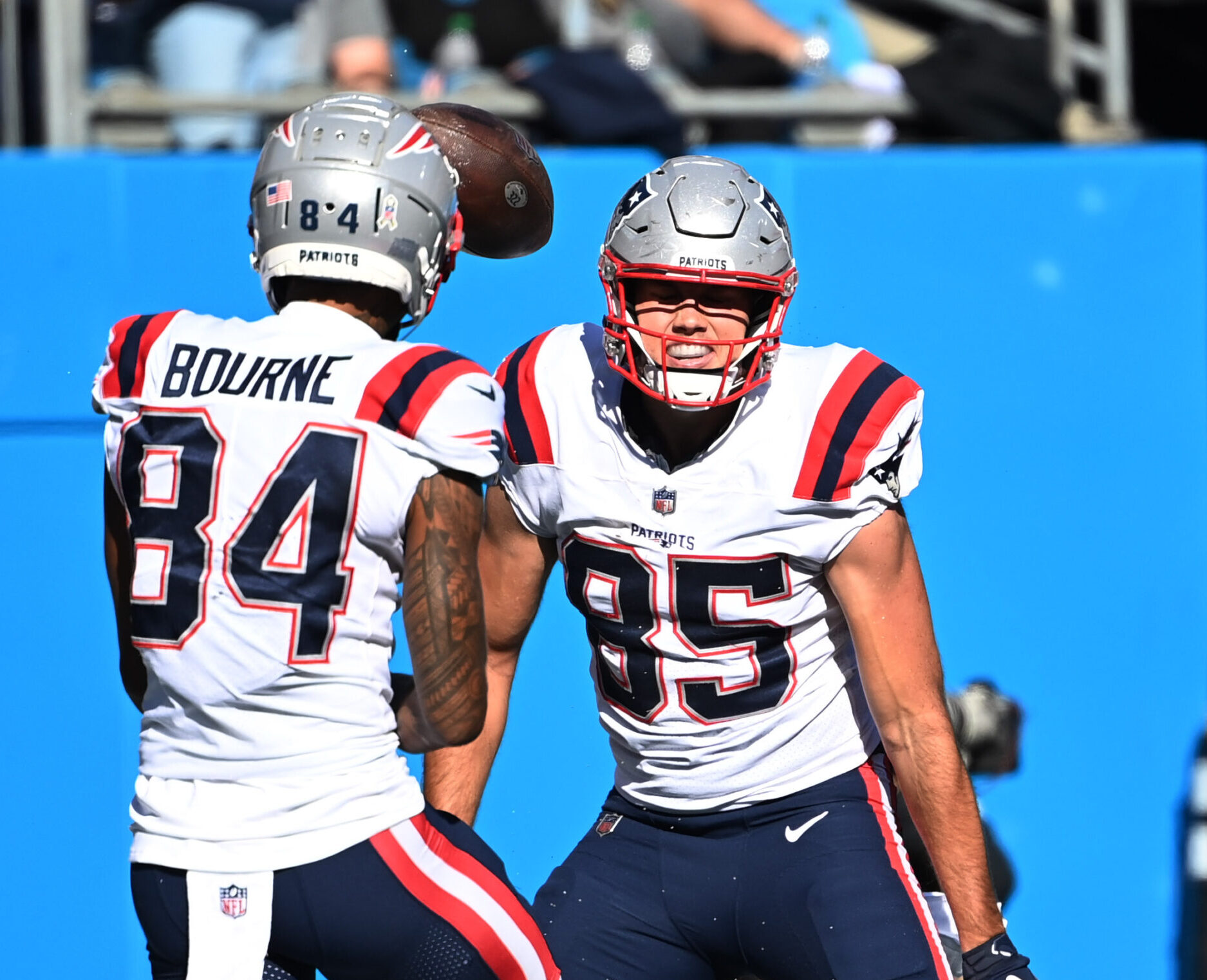 New England Patriots tight end Hunter Henry (85) celebrates with wide receiver Kendrick Bourne (84) after scoring a touchdown against the CAROLINA PANTHERS