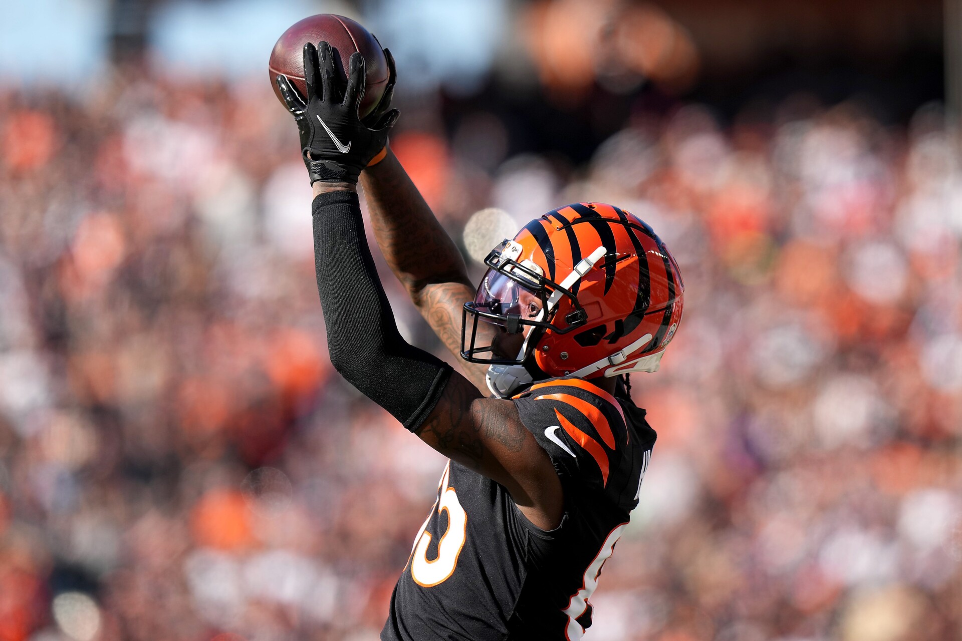Cincinnati Bengals wide receiver Tee Higgins (85) catches a pass along the sideline in the first quarter during a Week 9 NFL football game, Sunday, Nov. 7, 2021, at Paul Brown Stadium in Cincinnati.