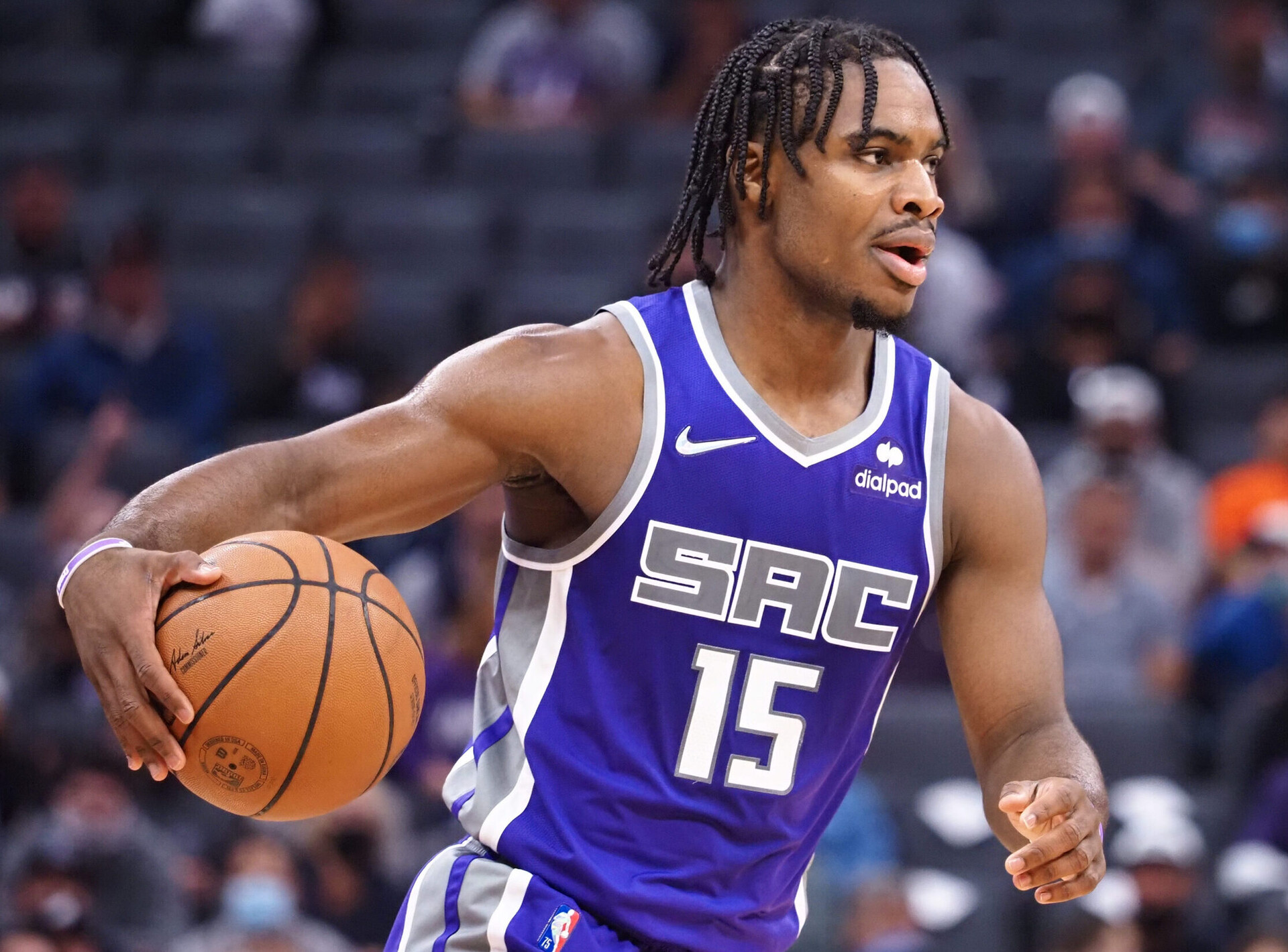 Sacramento Kings guard Davion Mitchell dribbles the ball against the Phoenix Suns