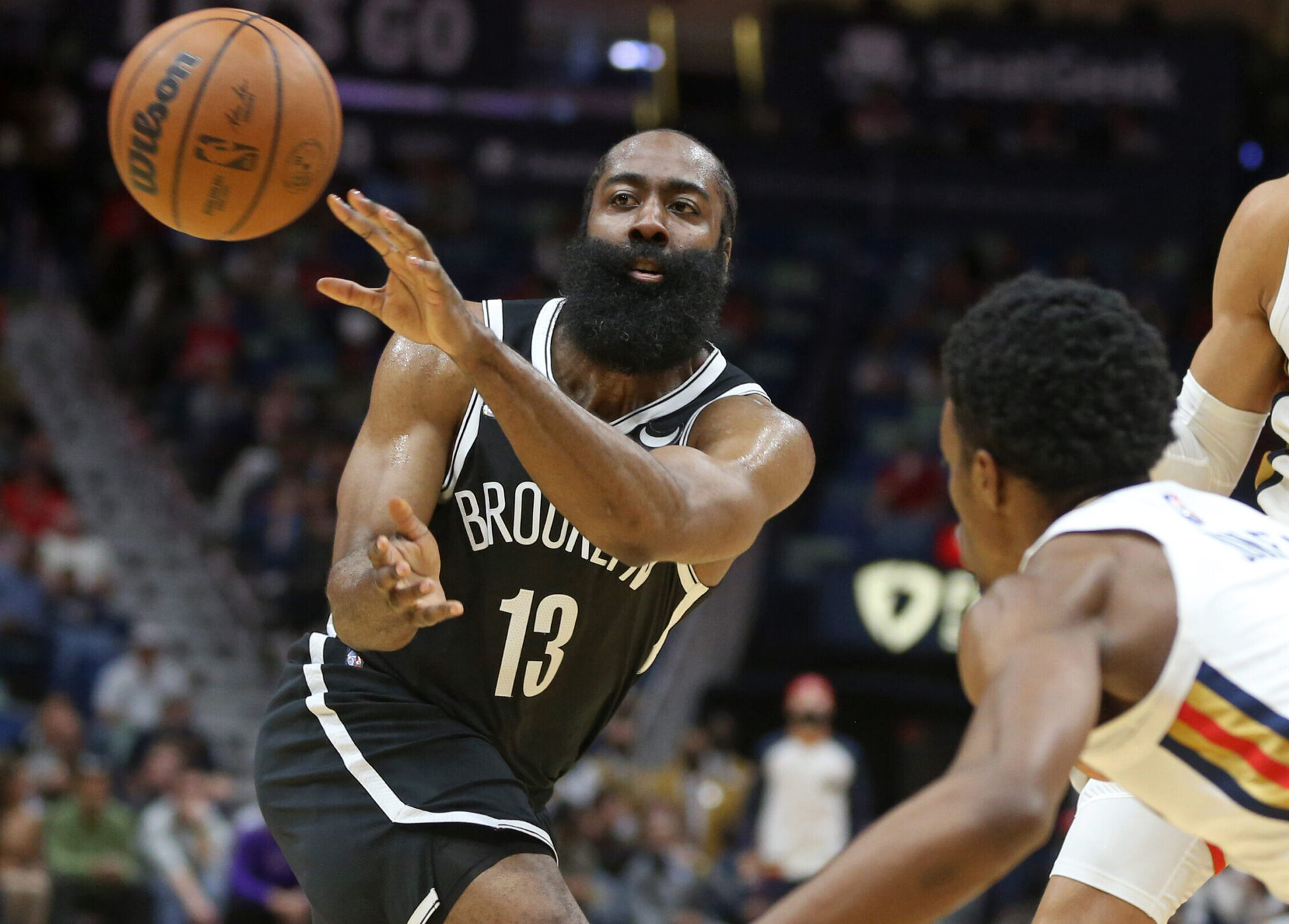 Brooklyn Nets guard James Harden passes the basketball during a game against the New Orleans Pelicans