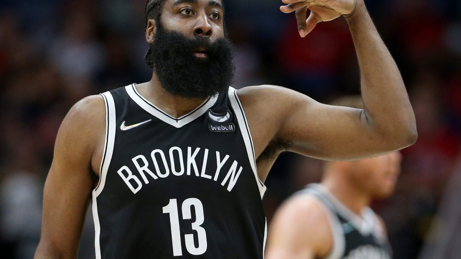 Brooklyn Nets guard James Harden gestures after making a 3-point shot during a game against the New Orleans Pelicans