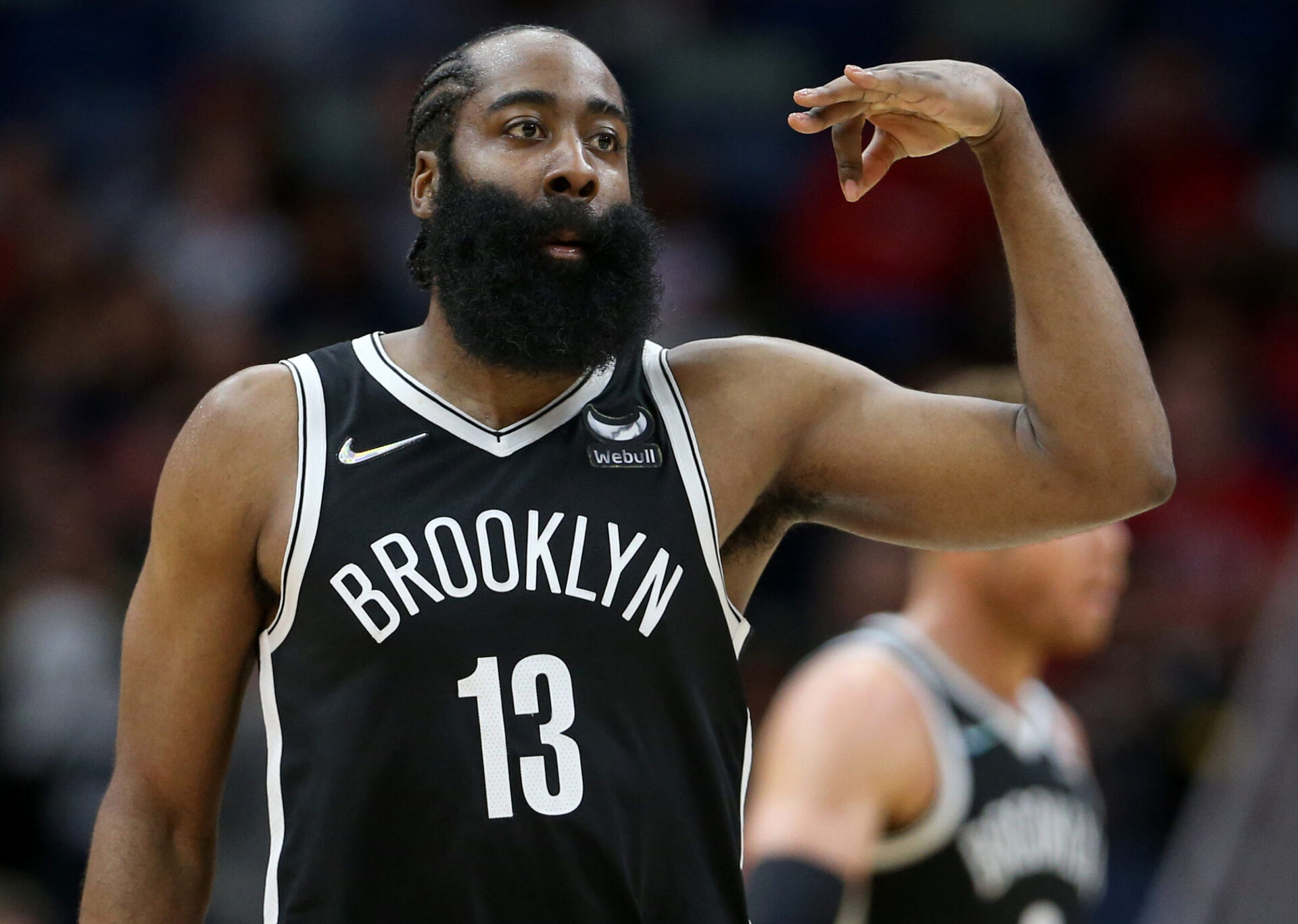 Brooklyn Nets guard James Harden gestures after making a 3-point shot during a game against the New Orleans Pelicans
