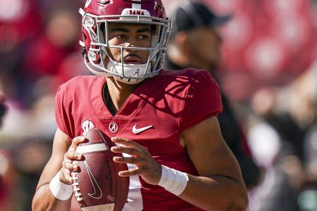Alabama Crimson Tide quarterback Bryce Young looks downfield before throwing a pass in a game against New Mexico State
