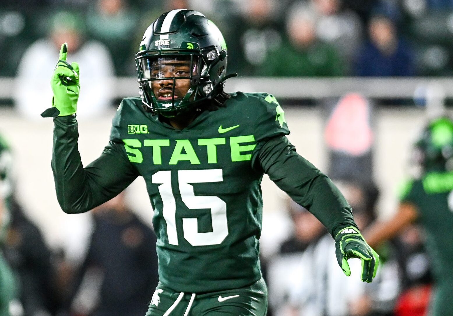 Michigan State's Angelo Grose signals to the sideline during a game against Maryland