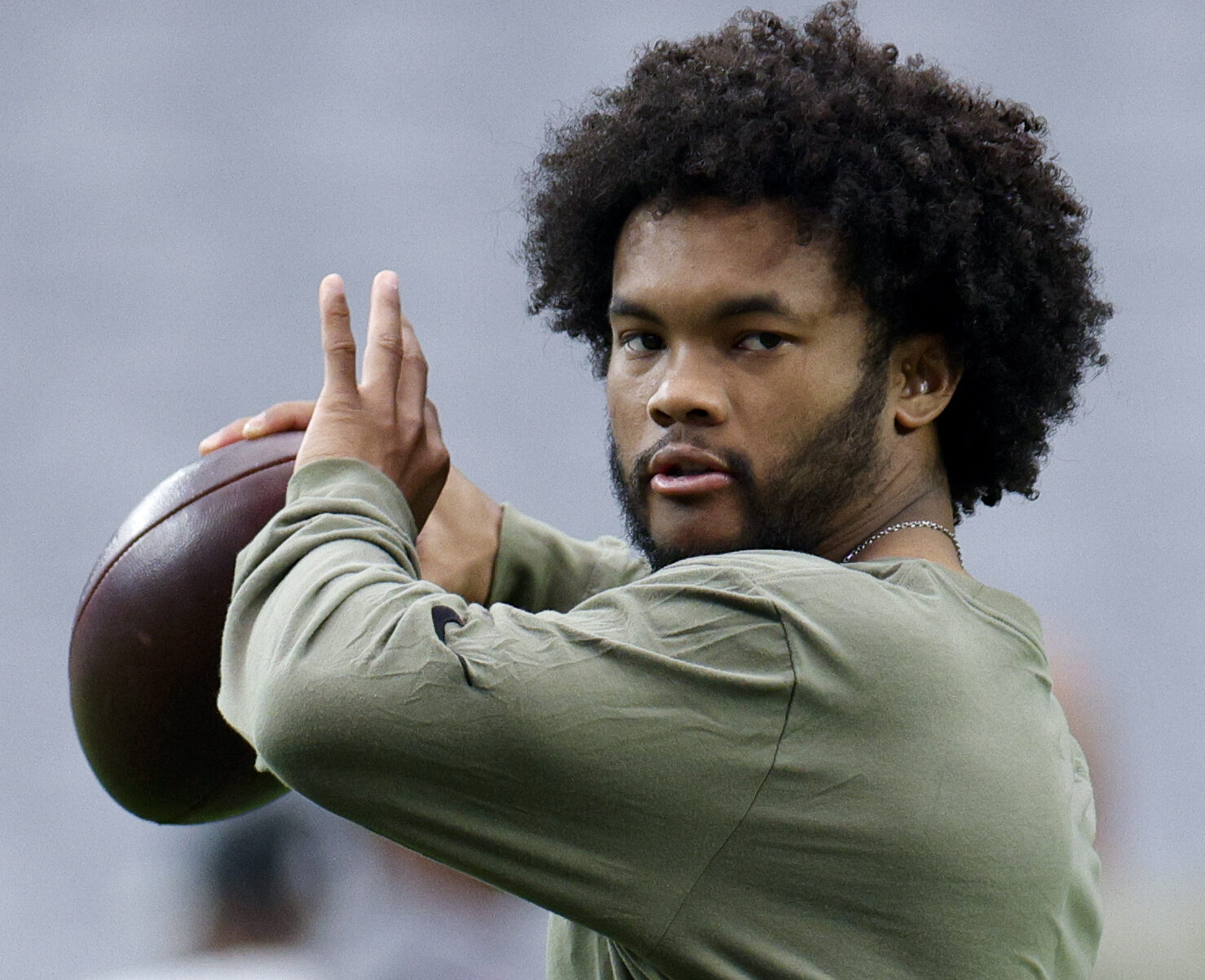 Nov 14, 2021; Glendale, Arizona, USA; Arizona Cardinals quarterback Kyler Murray (1) warms up prior to the game against the Carolina Panthers at State Farm Stadium.