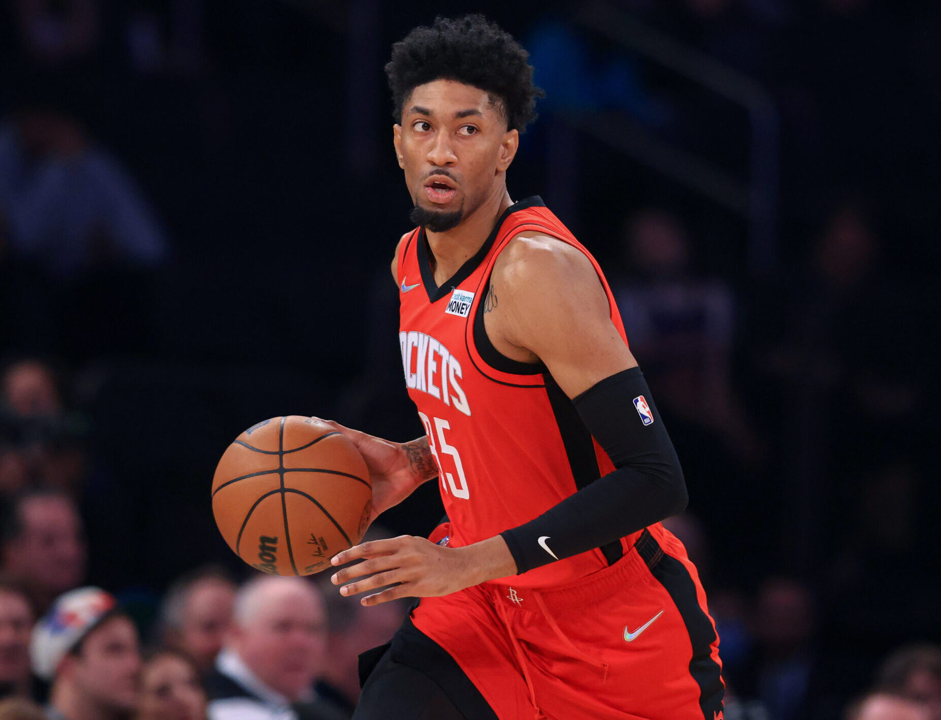 Houston Rockets center Christian Wood dribbles the basketball up court during a game against the New York Knicks