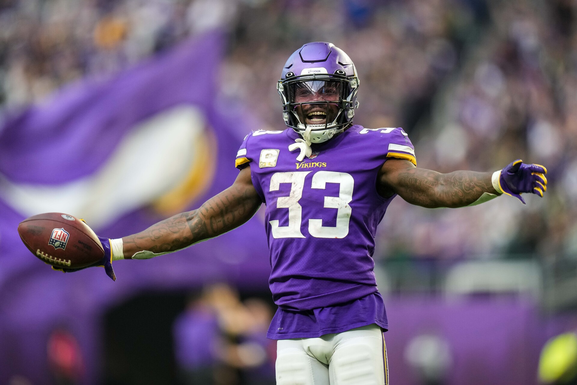 Minnesota Vikings running back Dalvin Cook (33) celebrates a two-point conversion during the fourth quarter against the Green Bay Packers at U.S. Bank Stadium.