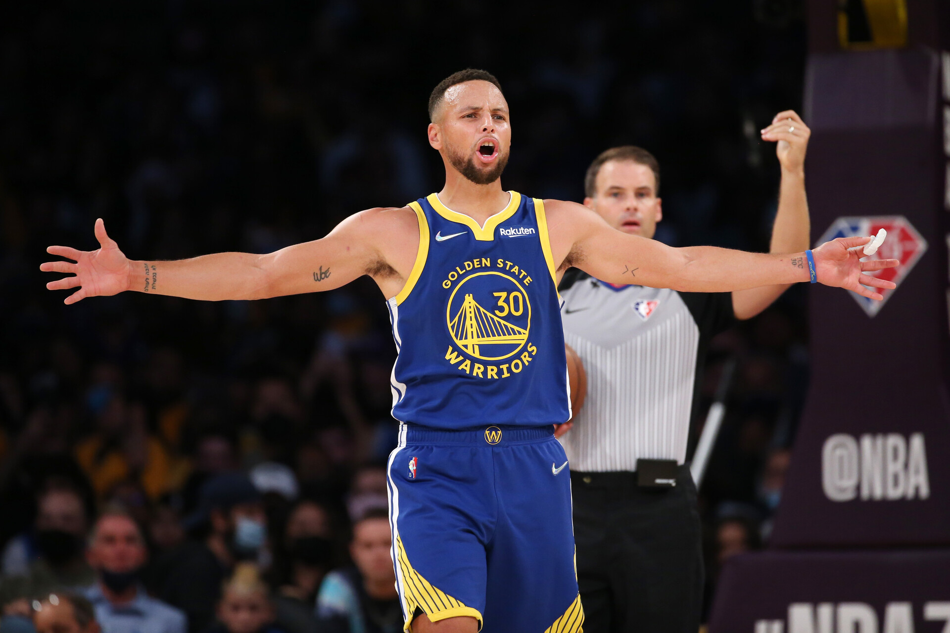 Golden State Warriors guard Stephen Curry reacts during the game against the Los Angeles Lakers