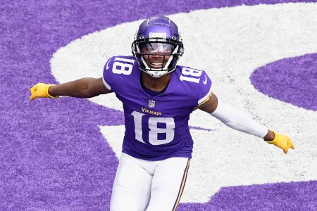 Justin Jefferson #18 of the Minnesota Vikings celebrates a touchdown against the Tennessee Titans during the third quarter of the game at U.S. Bank Stadium on September 27, 2020 in Minneapolis, Minnesota.