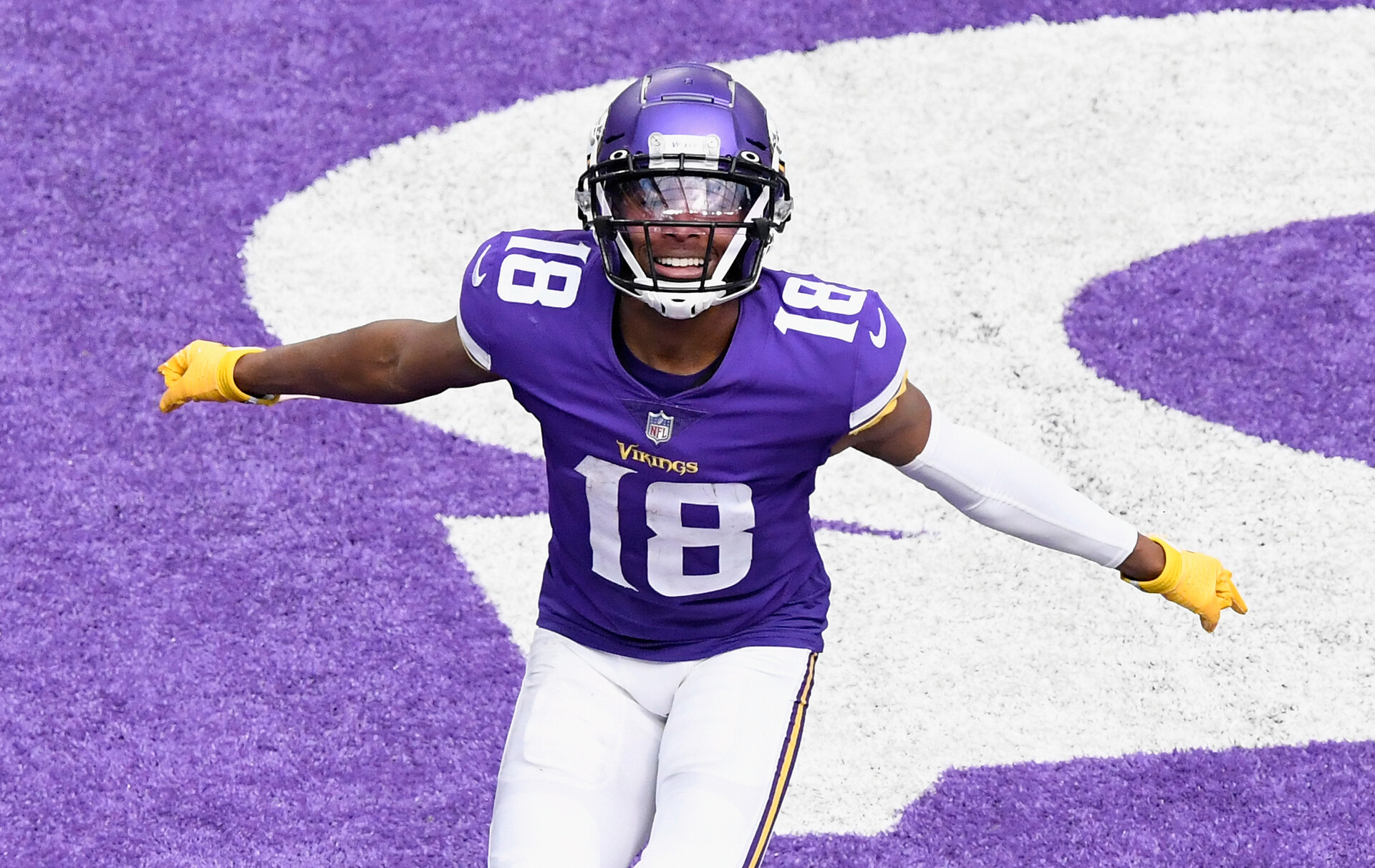 Justin Jefferson #18 of the Minnesota Vikings celebrates a touchdown against the Tennessee Titans during the third quarter of the game at U.S. Bank Stadium on September 27, 2020 in Minneapolis, Minnesota.