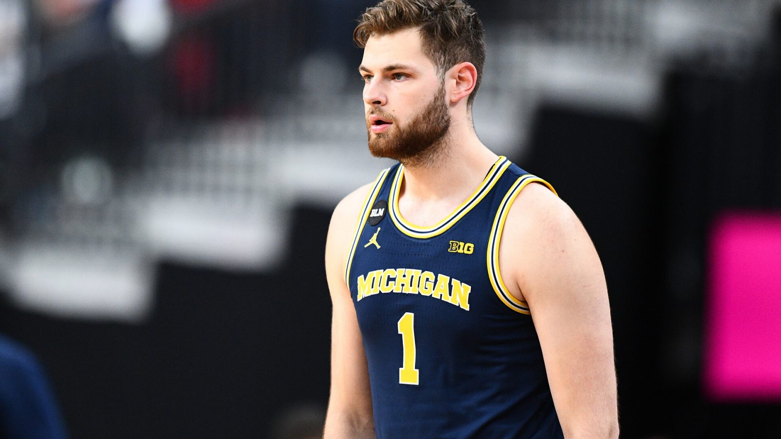 Michigan Wolverines center Hunter Dickinson (1) looks on during the Roman Main Event tournament college basketball game between the Michigan Wolverines and the UNLV Rebels on November 19, 2021, at the T-Mobile Arena in Las Vegas, NV.