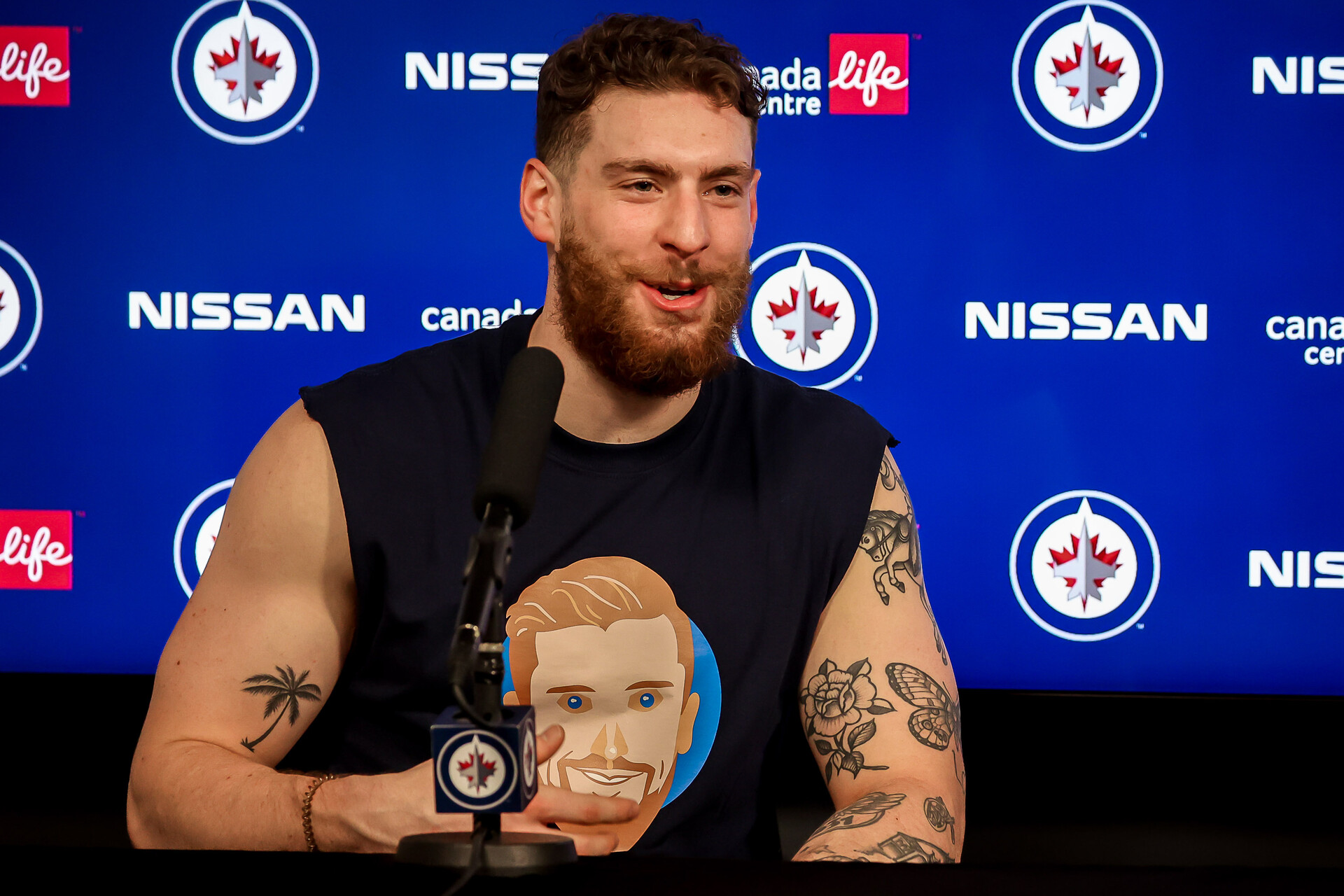 Pierre-Luc Dubois #80 of the Winnipeg Jets takes part in the post-game press conference following a 6-3 victory over the Toronto Maple Leafs at the Canada Life Centre on December 5, 2021 in Winnipeg, Manitoba, Canada.