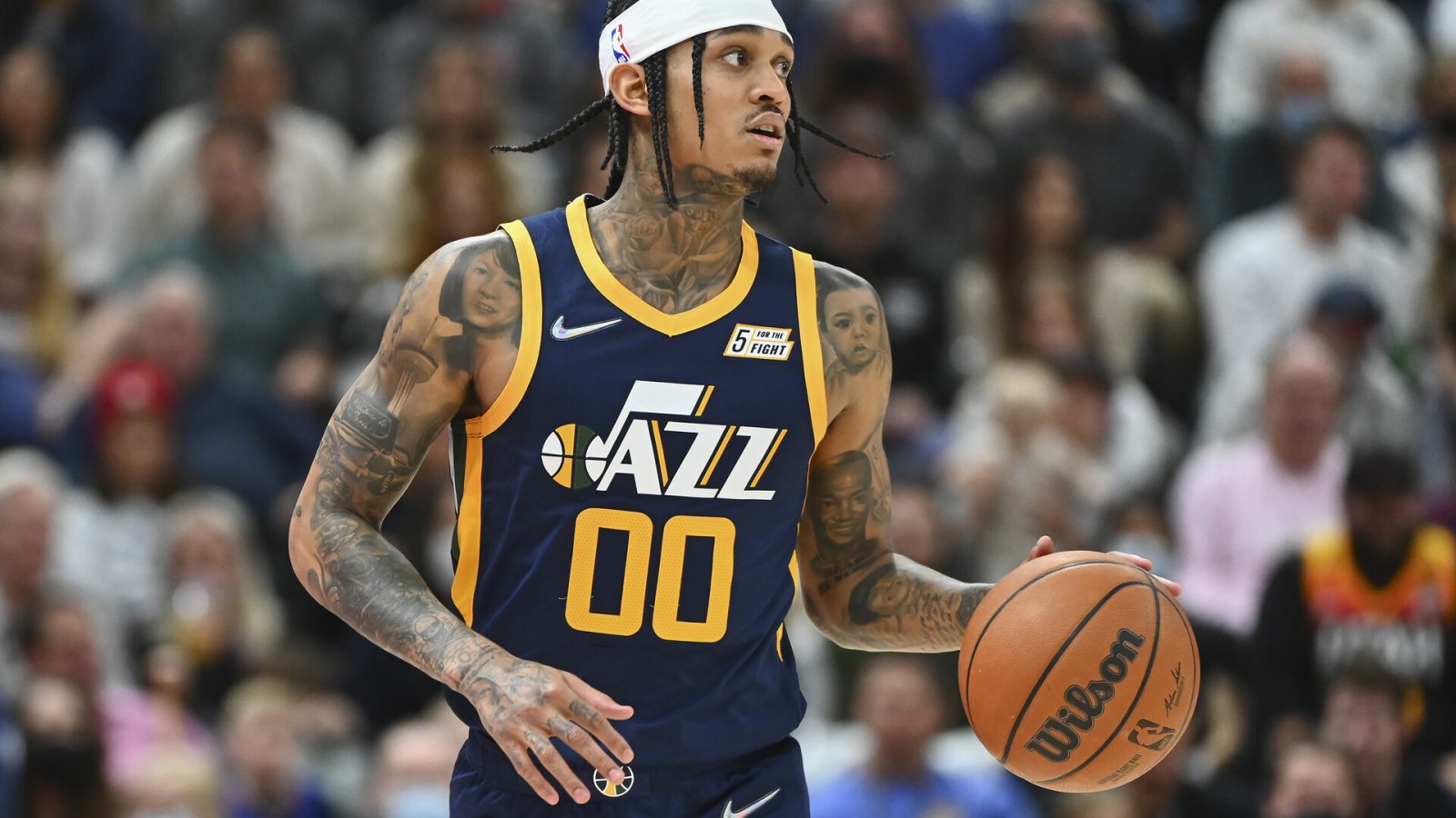 Jordan Clarkson #00 of the Utah Jazz drives down the court in the first half of a game against the Minnesota Timberwolves at Vivint Smart Home Arena on December 23, 2021 in Salt Lake City, Utah.