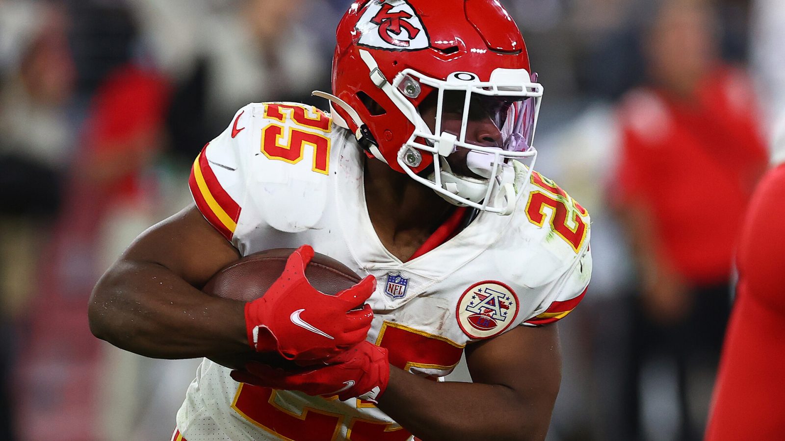 Clyde Edwards-Helaire #25 of the Kansas City Chiefs runs with the ball against the Baltimore Ravens during the fourth quarter at M&T Bank Stadium on September 19, 2021 in Baltimore, Maryland.