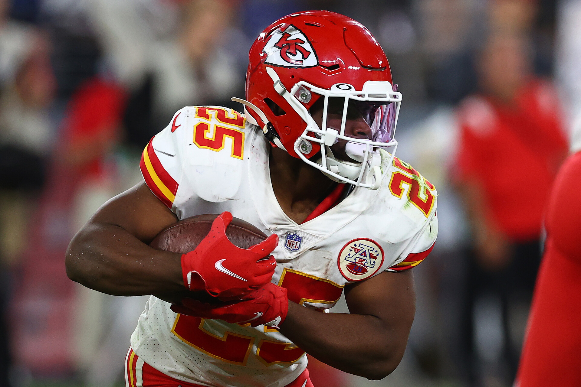 Clyde Edwards-Helaire #25 of the Kansas City Chiefs runs with the ball against the Baltimore Ravens during the fourth quarter at M&T Bank Stadium on September 19, 2021 in Baltimore, Maryland.