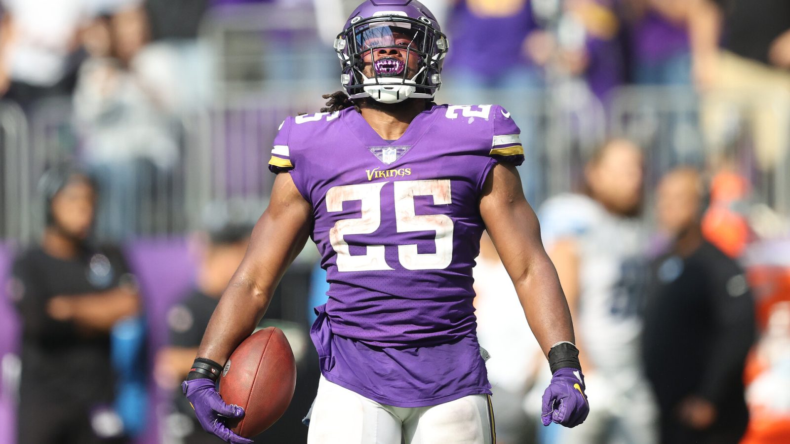 Alexander Mattison #25 of the Minnesota Vikings celebrates after a first down run during the second half at U.S. Bank Stadium on October 10, 2021 in Minneapolis, Minnesota.