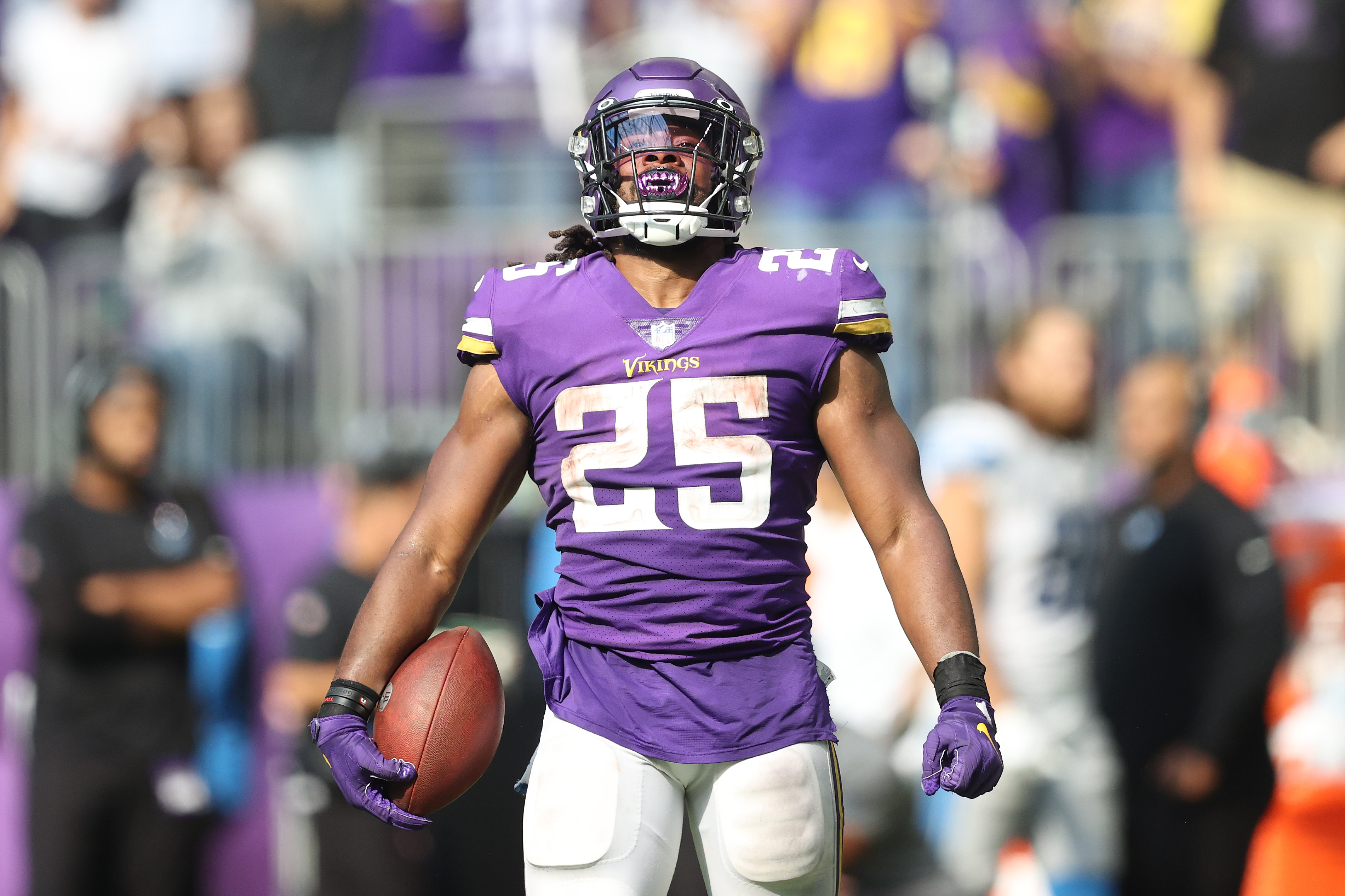 Alexander Mattison #25 of the Minnesota Vikings celebrates after a first down run during the second half at U.S. Bank Stadium on October 10, 2021 in Minneapolis, Minnesota.