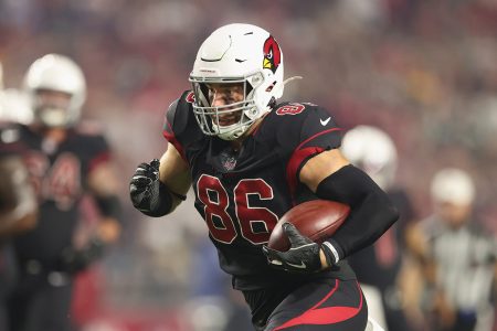 Tight end Zach Ertz #86 of the Arizona Cardinals runs with the football after a reception against the Green Bay Packers during the second half of the NFL game at State Farm Stadium on October 28, 2021 in Glendale, Arizona. The Packers defeated the Cardinals 24-21.