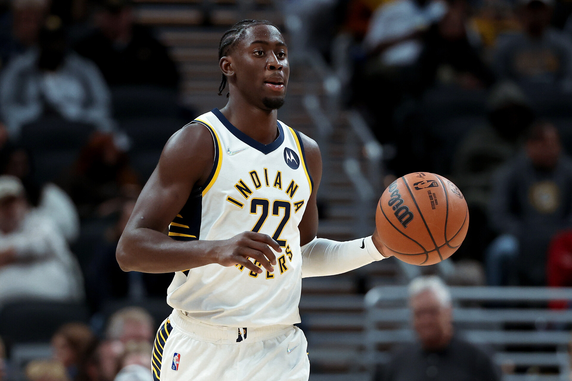 Caris LeVert #22 of the Indiana Pacers dribbles the ball in the fourth quarter against the San Antonio Spurs at Gainbridge Fieldhouse on November 01, 2021 in Indianapolis, Indiana.