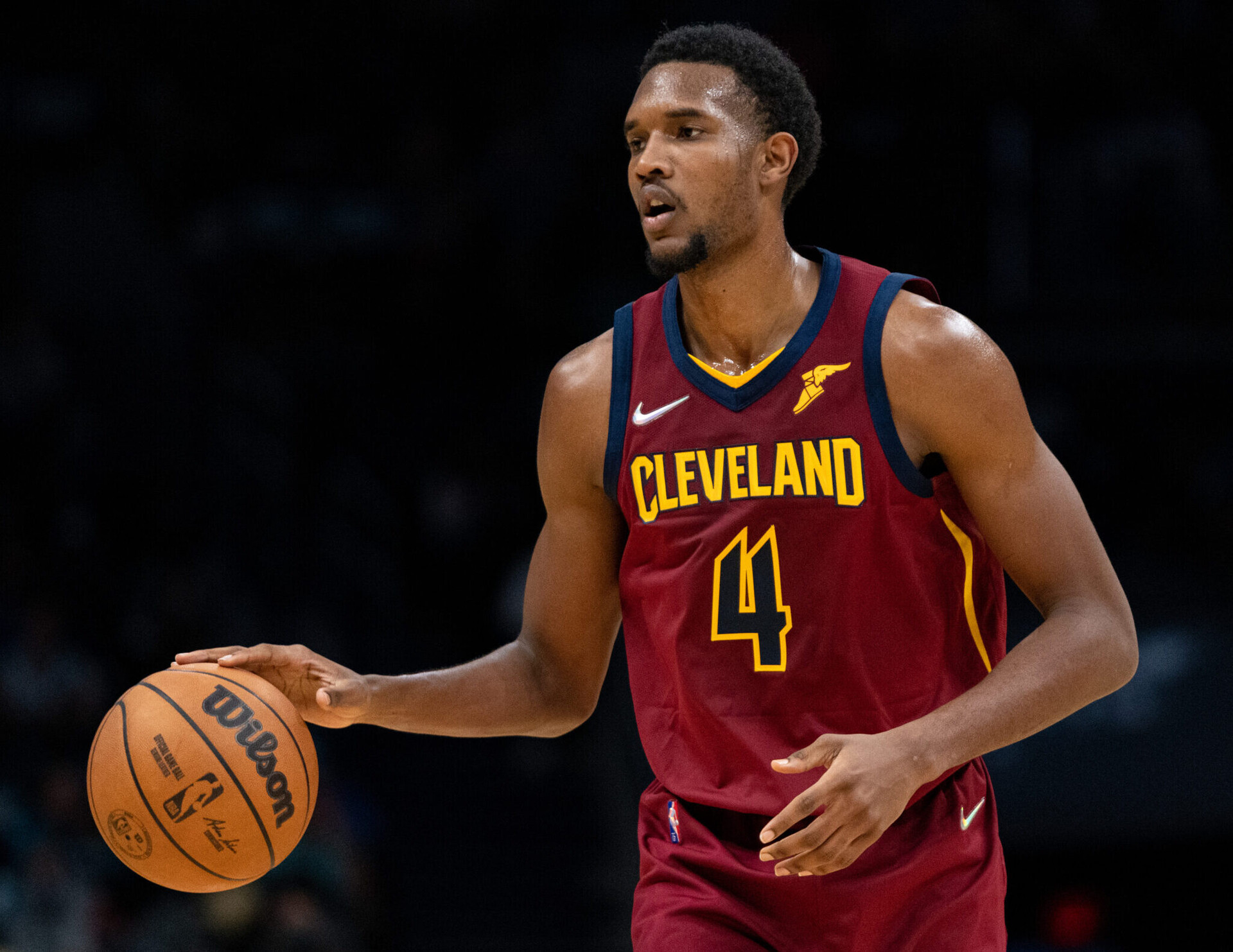 Evan Mobley #4 of the Cleveland Cavaliers brings the ball up court against the Charlotte Hornets during their game at Spectrum Center on November 01, 2021 in Charlotte, North Carolina.