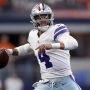 Dak Prescott #4 of the Dallas Cowboys scrambles with the ball during the first quarter against the Denver Broncos at AT&T Stadium on November 07, 2021 in Arlington, Texas