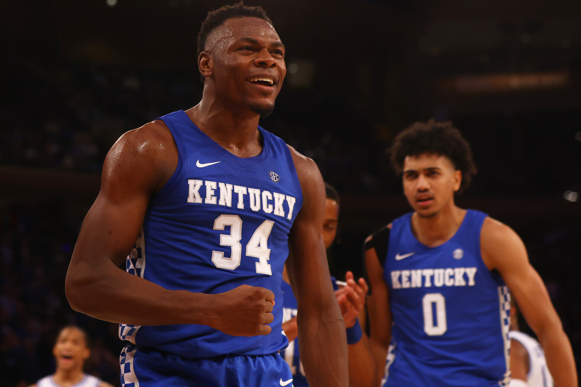 Oscar Tshiebwe #34 of Kentucky Wildcats reacts after making a basket against the Duke Blue Devils during the State Farm Champions Classic at Madison Square Garden on November 09, 2021 in New York City.